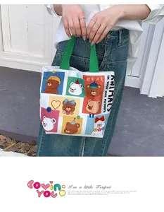 Cute canvas tote bag with colorful bear print and green handles, daily casual handbag for women.