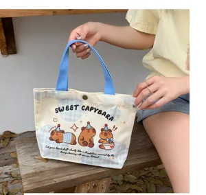 Cute capybara print canvas tote bag, casual large capacity shopping handbag for daily use.