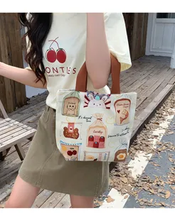 Close-up view of the cute cartoon canvas tote bag with bread prints, perfect for daily casual use.