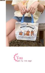 Cute cartoon capybara canvas tote bag, large capacity casual handbag for women and girls daily.