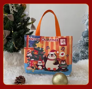 Sac cabas en toile de Noël pour femmes, joli sac à main imprimé pingouin dessin animé.