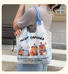 Cute capybara print canvas tote bag for women, large capacity casual shoulder bag daily use.