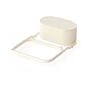 Kitchen sink strainer basket and garbage bag holder, multi-functional drain rack in cream white.