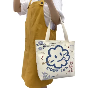 Large capacity canvas tote bag for women, cute cloud print ins style shoulder handbag.