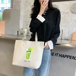 Canvas tote bag large capacity casual shoulder bag for women daily commuting and shopping.
