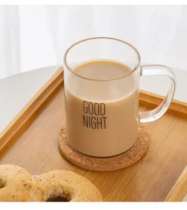 Clear glass coffee mug with handle heat resistant breakfast milk cup for daily home use detail view.