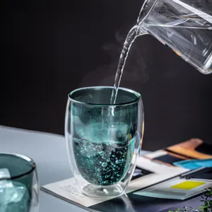 Creative double-walled insulated glass cup for coffee and tea, stylish home water tumbler.
