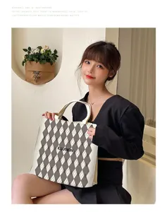 Stylish large capacity canvas tote bag featuring diamond pattern, ideal for daily school use.