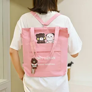 Pink canvas backpack for women cute cartoon bear print casual shoulder bag daily use.