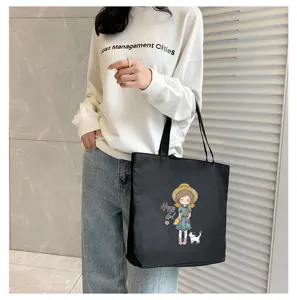 Canvas tote bag for women, large capacity cartoon print shoulder bag for daily commuting.