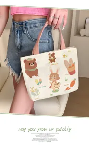 Cute canvas tote bag for women, casual handbag with cute cartoon bear print for daily commute.