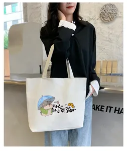 Large capacity white canvas tote bag with cute hamster print, casual student shoulder bag.