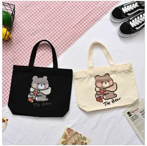 Cute canvas tote bag for women, stylish casual lunch bag with cute bear print and handles.