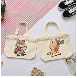 Cute cartoon bear and rabbit print canvas tote bag, perfect for daily casual use or lunch.