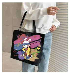 Casual canvas tote bag for women, large capacity shoulder handbag with stylish graffiti rabbit print.
