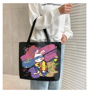 Black canvas tote bag for women with cool rabbit graffiti print, large capacity handbag.