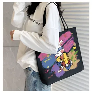 Stylish canvas tote bag with cool graffiti rabbit print for students, large capacity design.