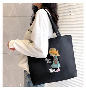 Black canvas tote bag for women, large capacity shoulder bag with cute cartoon print.