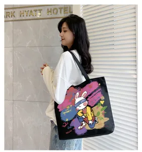 Casual canvas tote bag for women, large capacity shoulder bag with graffiti rabbit print.