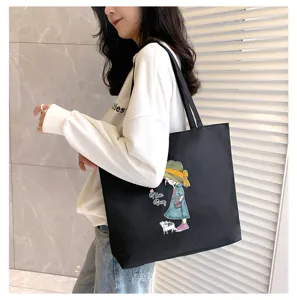 Casual black canvas tote bag for women, large capacity daily shopping and school handbag.