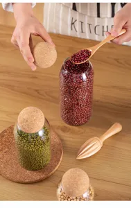 Glass storage jar with cork ball lid for coffee beans, tea and grains kitchen organizer