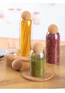 Clear glass storage jar with round cork ball lid for kitchen food grain organization