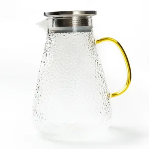 Heat-resistant glass hammered water pitcher with stainless steel filter lid and yellow handle