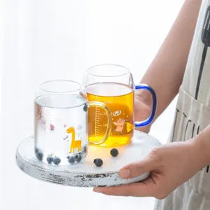 Kids glass milk cup with scale and cute cartoon print, transparent breakfast cup for home use.