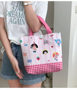 Pink striped canvas tote bag with cute cartoon prints, large capacity commuting handbag.