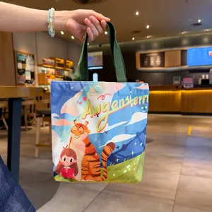 Cute cartoon canvas tote bag with tiger pattern, stylish casual handbag for daily commute.