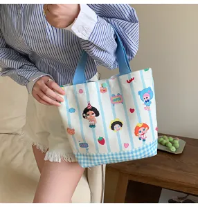 Fashionable cartoon canvas tote bag with cute prints, large capacity casual lunch handbag.