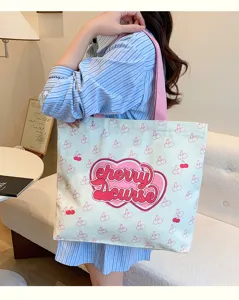 Cute canvas tote bag for women, large capacity shoulder bag with sweet cherry print design.