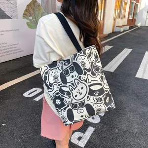 Schwarze und weiße Cartoon gedruckte Damen Canvas Tragetasche für Alltag und Schule.