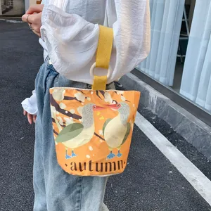 Canvas bucket bag for women stylish casual handbag with wooden ring handle and cute print