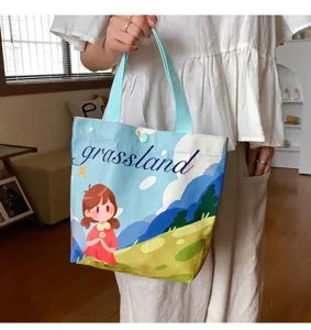 Cute canvas tote bag for women, daily casual small handbag with cartoon print, durable fabric.