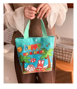 Detailed view of the cute canvas tote bag featuring a summer watermelon cartoon print.