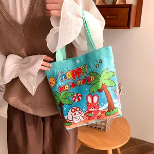 Cute cartoon print canvas tote bag with comfortable handles and secure snap closure for daily use.