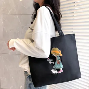 Black canvas tote bag for women, large capacity shoulder bag with cute cartoon print.