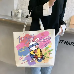 Large capacity canvas tote bag for women, trendy graffiti rabbit print aesthetic shoulder bag.