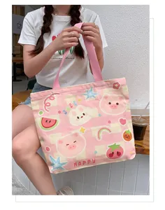 Cute pink canvas tote bag with lovely cartoon patterns, large capacity for daily use and school.