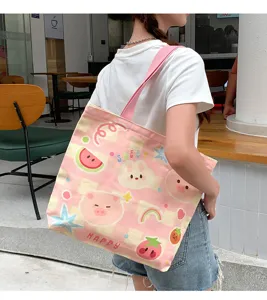 Cute pink canvas tote bag for women large capacity casual shoulder shopping bag.