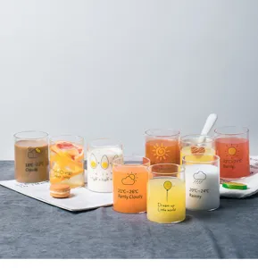Clear glass cup with cute weather and fruit print, ideal for morning milk, juice or drinks.