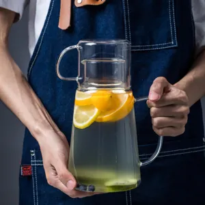 Ensemble pichet à eau en verre résistant à la chaleur avec tasse, grande bouilloire froide.