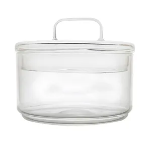 Bol en verre résistant à la chaleur minimaliste avec couvercle et poignée pour fruits ou collations.