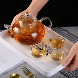Théière en Verre Borosilicaté Fait Main Théière pour Thé Parfumé Résistante à la Chaleur Avec Filtre Tasse en Verre Double Paroi Base Chauffe-plat
