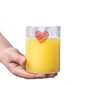 Creative glass cup with cute red heart pattern, perfect for morning milk, juice and water.