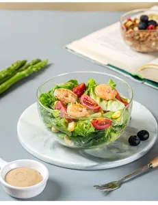 Clear glass mixing bowl with convenient pouring spout for salad dessert and kitchen prep