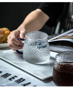 Japanese hammer pattern glass cup with handle and lid, elegant home tea water separation cup.
