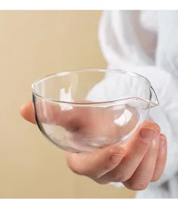 Glass bowl detail showing smooth pouring spout and transparent heat-resistant material design.