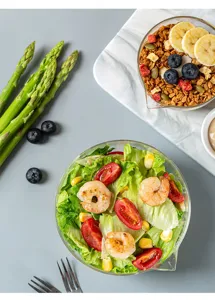 Heat-resistant glass bowl with pouring spout for salad, dessert, sauce, and baking preparation.